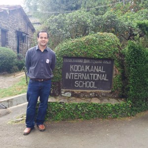 Near the Main Gate at Kodaikanal International School visit in 2016.